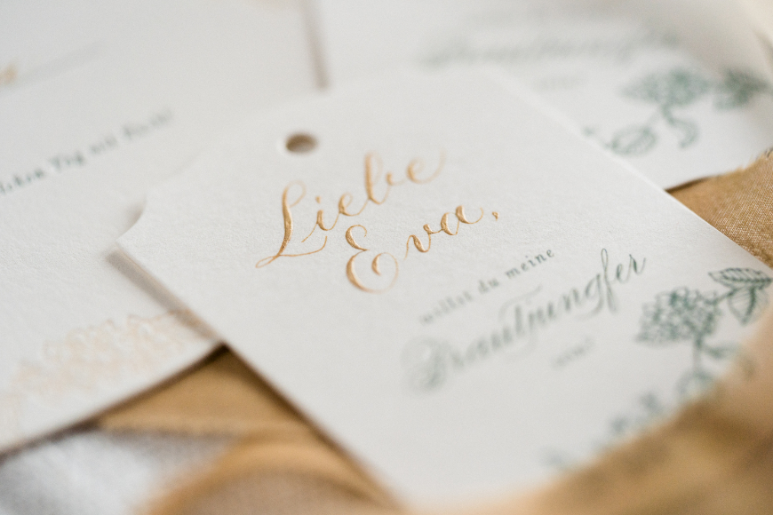 Gold calligraphy invitation