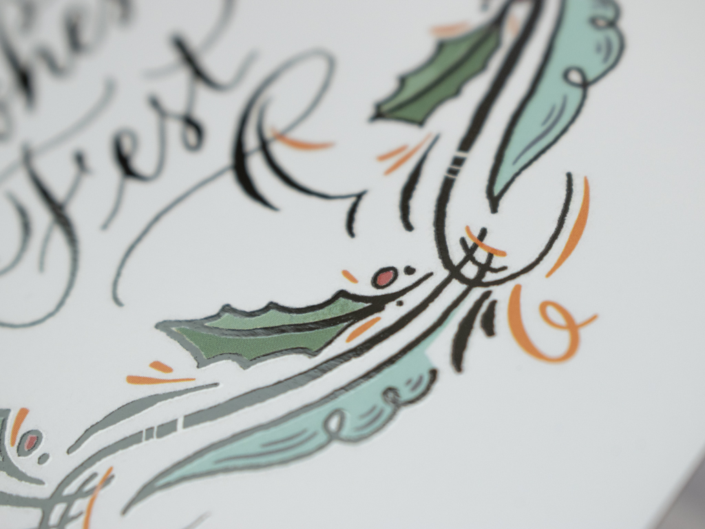 Selbst gestaltete Weihnachtskarte mit Kalligraphie und gezeichneten Weihnachtselementen