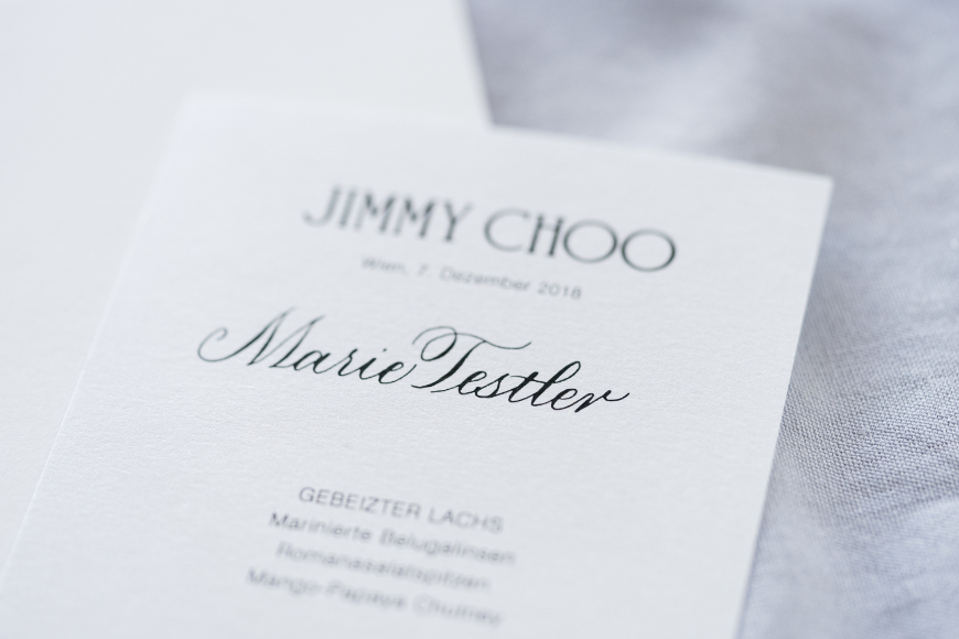 Menu card with simple black calligraphy name